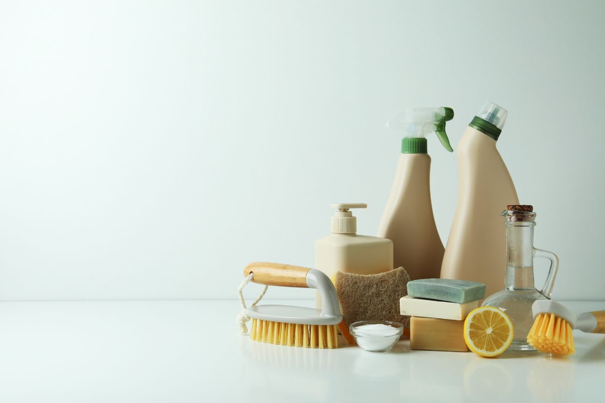 A collection of eco-friendly cleaning products displayed on a white surface, promoting sustainable carpet cleaning solutions.